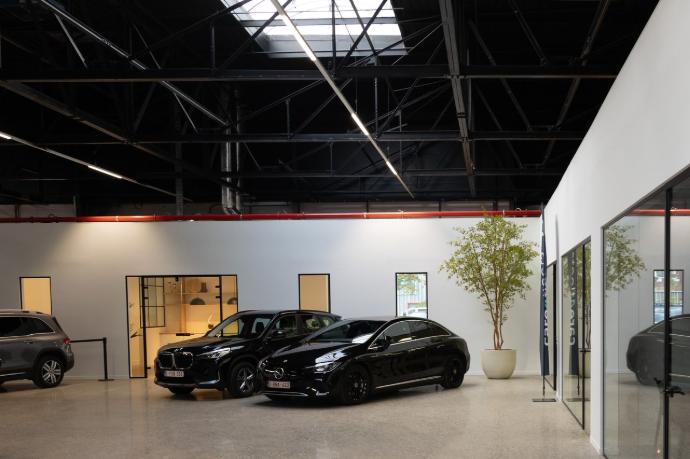 two cars parked in delivery center Care4fleets