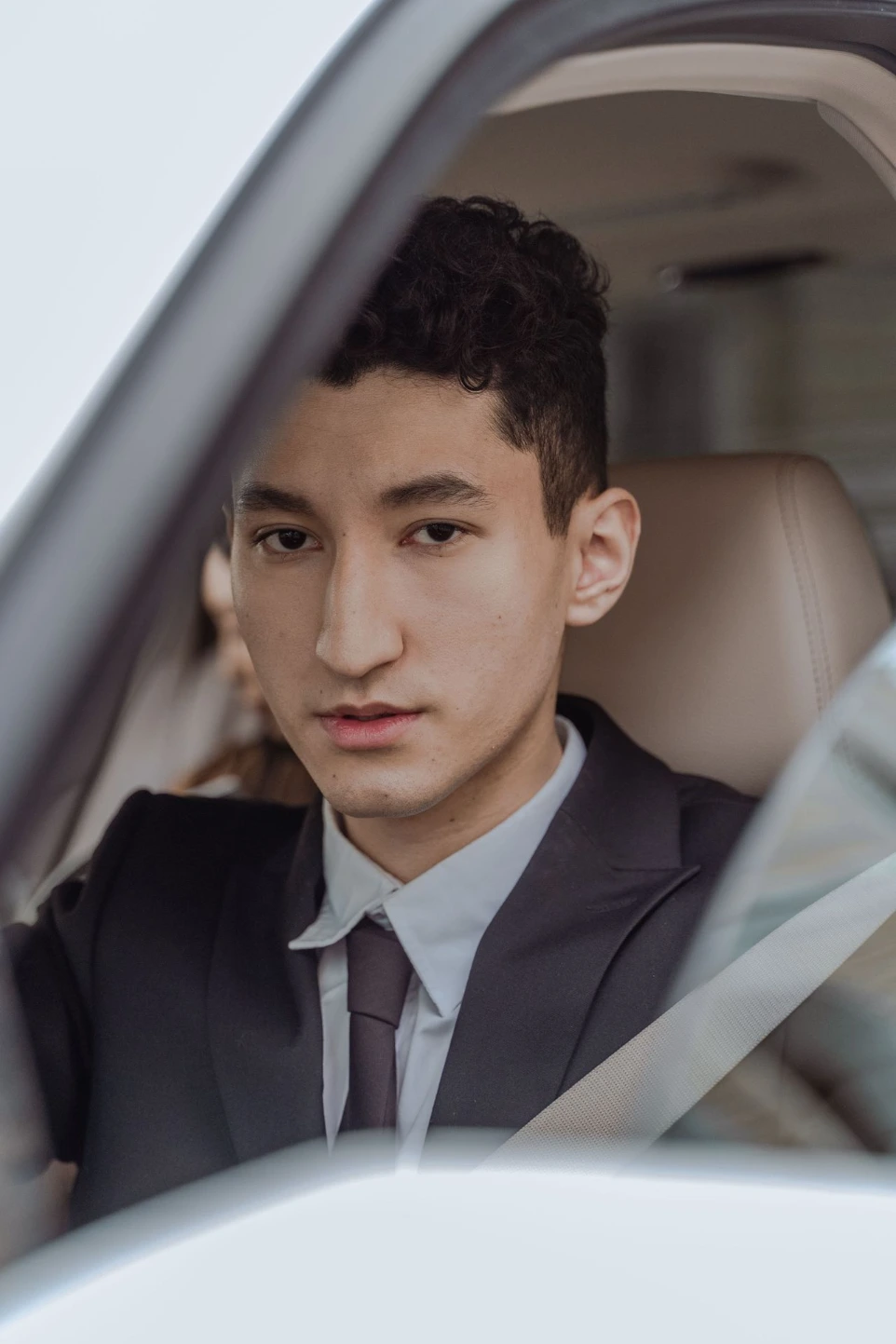 Photo of young driver driving for CrewUP